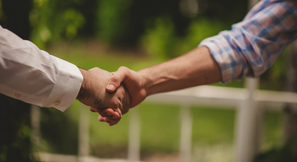 Two people shaking hands in Kansas